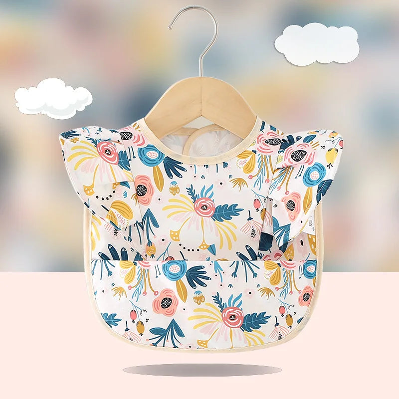 Bavoir imperméable anti-salissures , manches à volants