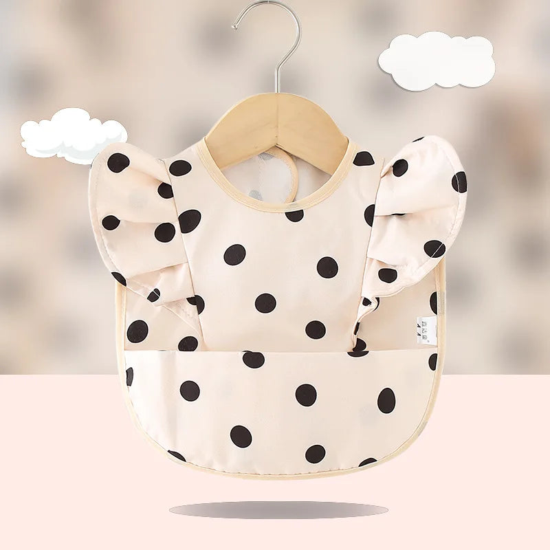Bavoir imperméable anti-salissures , manches à volants