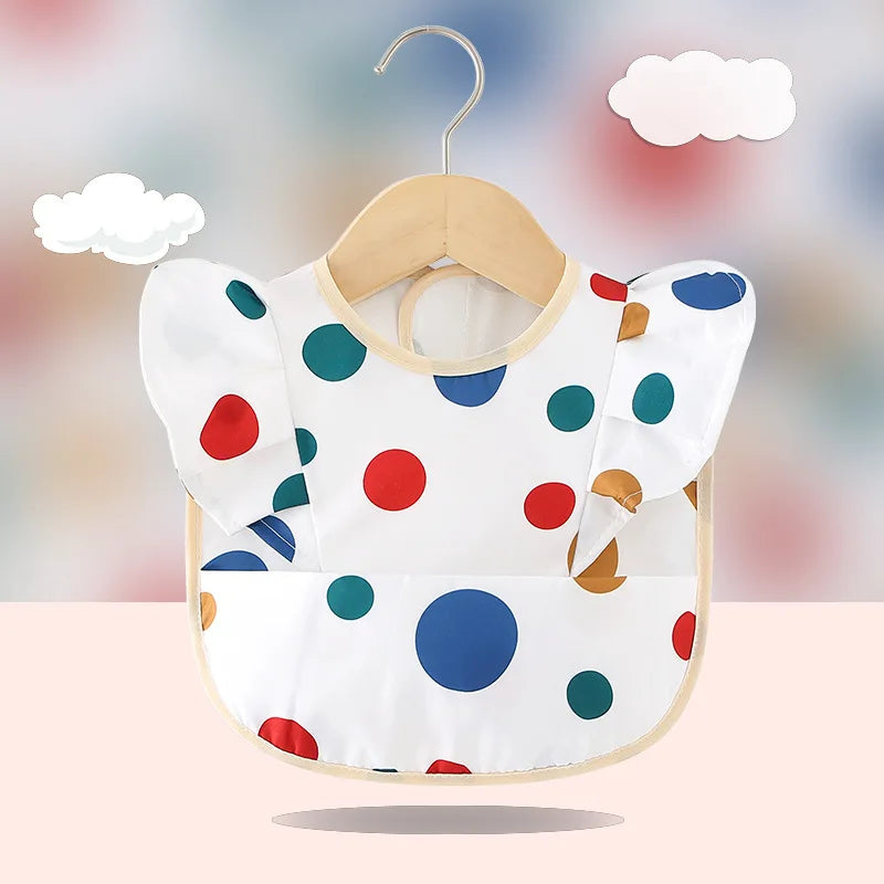 Bavoir imperméable anti-salissures , manches à volants